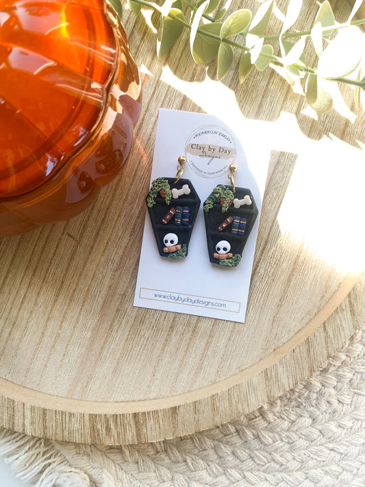 Coffin Bookcase w/moss  - Bookish