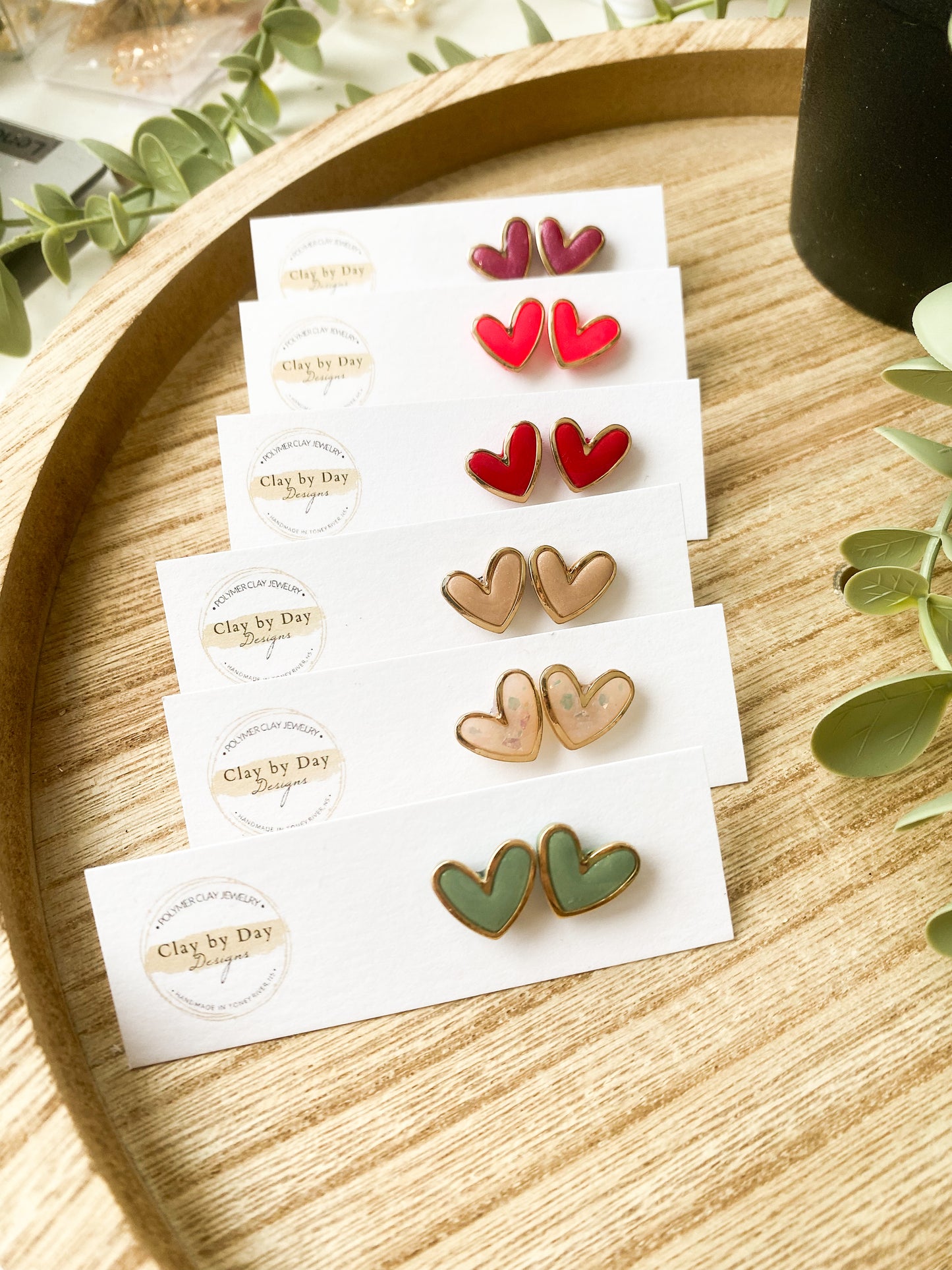 Gold Trim Heart Studs