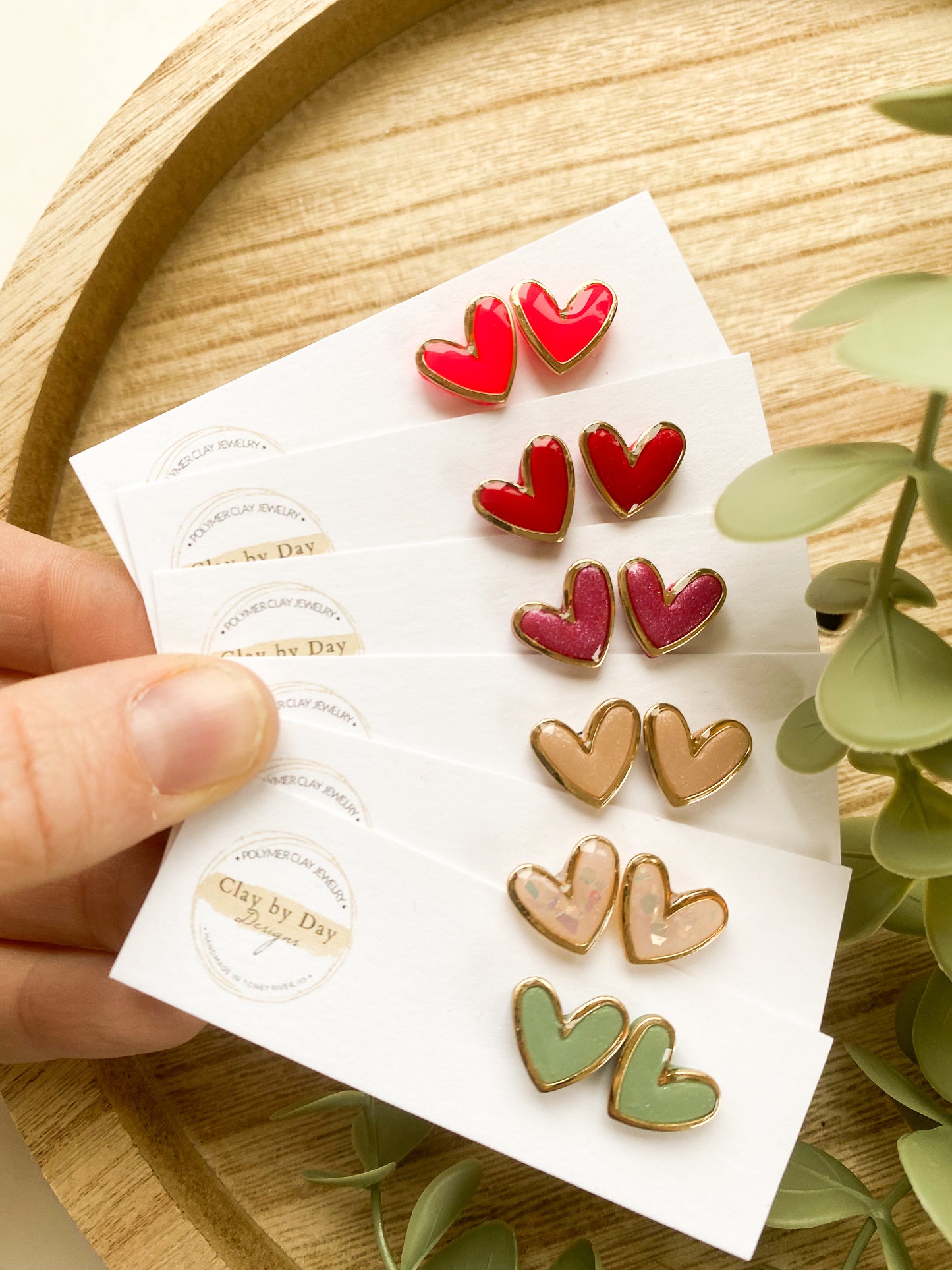 Gold Trim Heart Studs